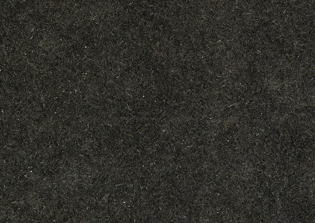 HQ cartón cartón papel sin recubrimiento textura fondo negro gran grano áspero fibra partículas de polvo