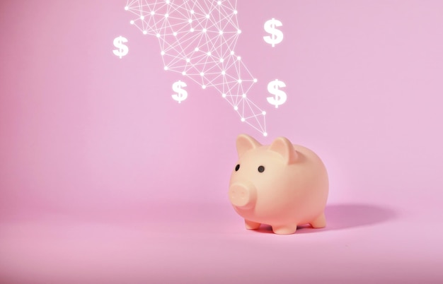 Hucha aislada sobre fondo rosa Concepto de ahorro de dinero