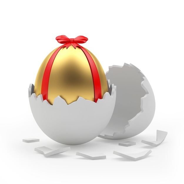 Huevo de Pascua dorado en una cáscara de huevo rota