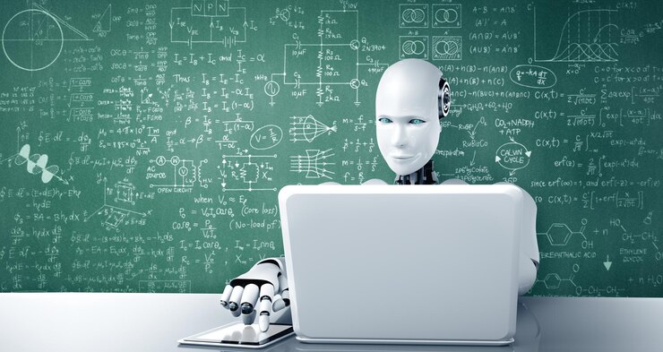 Foto el humanoide robot xai usa una computadora portátil y se sienta en la mesa para estudiar ciencias de la ingeniería