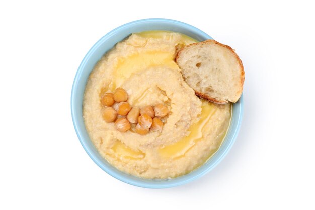 Hummus isolado na vista superior de fundo branco