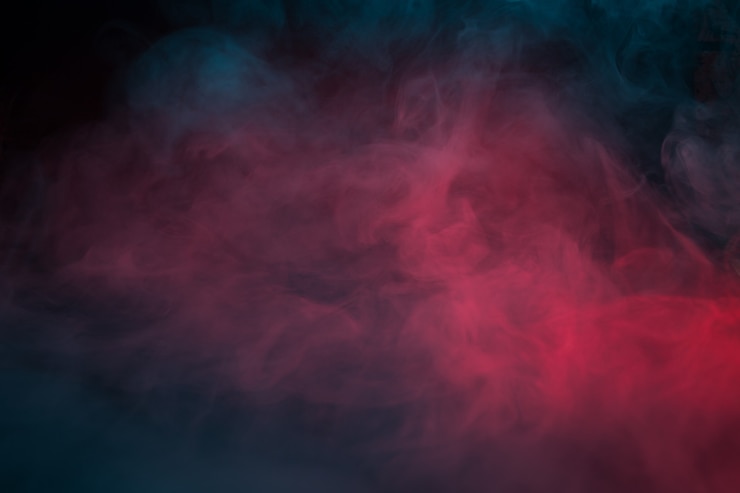 Foto humo de colores sobre un fondo negro closeup