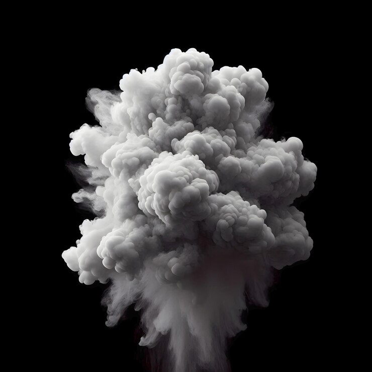 El humo explota sobre un fondo negro oscuro.