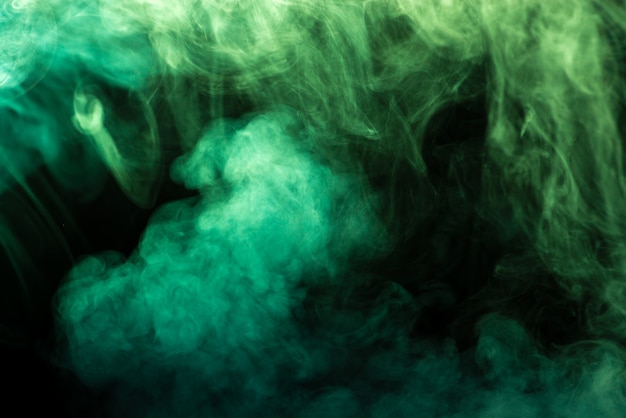 Humo verde sobre negro - fondo abstracto