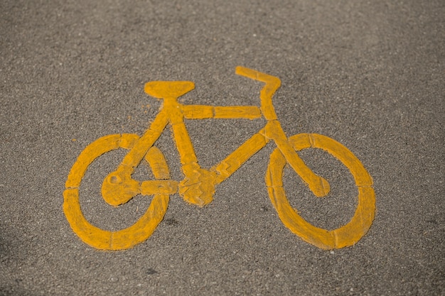 Icono de bicicleta en las calles de los días soleados.