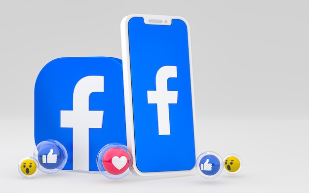 El icono de Facebook en la pantalla del teléfono inteligente y las reacciones de Facebook aman, guau, como emoji con espacio de copia