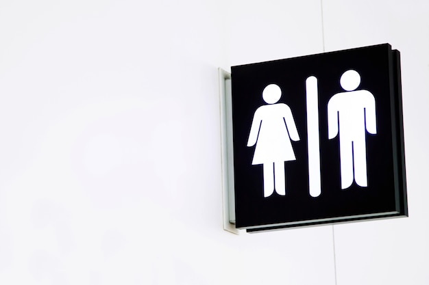 Los iconos de signo de aseo establecen signos de WC de hombre y mujer para baño