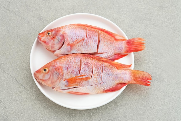 Ikan Nila Merah El pescado crudo de tilapia roja es un tipo de consumo de pescado de agua dulce