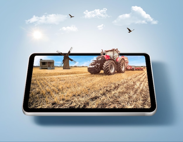 Foto ilustración 3d de tierras agrícolas con tractor en pantalla de tableta flotante aislada con nubes. granja de trigo