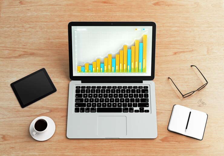 Foto ilustración del gráfico financiero en la computadora portátil