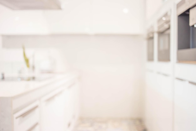 imagem borrada do interior da cozinha moderna para o fundo