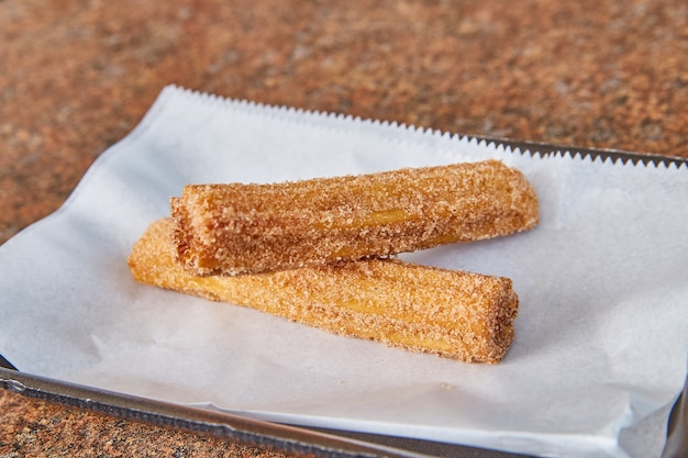 Imagem de churro mexicano coberto de açúcar