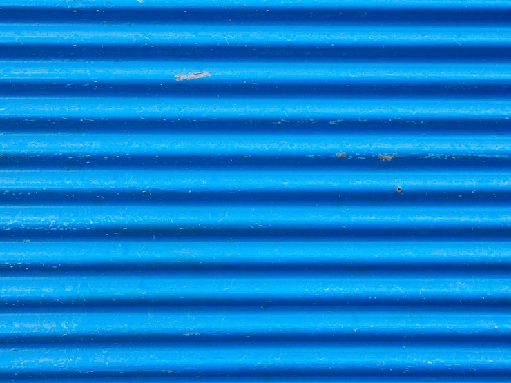 Foto imagem de quadro completo da parede de textura azul