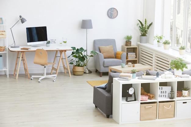 Imagem de uma sala de estar moderna com local de trabalho e móveis modernos na casa