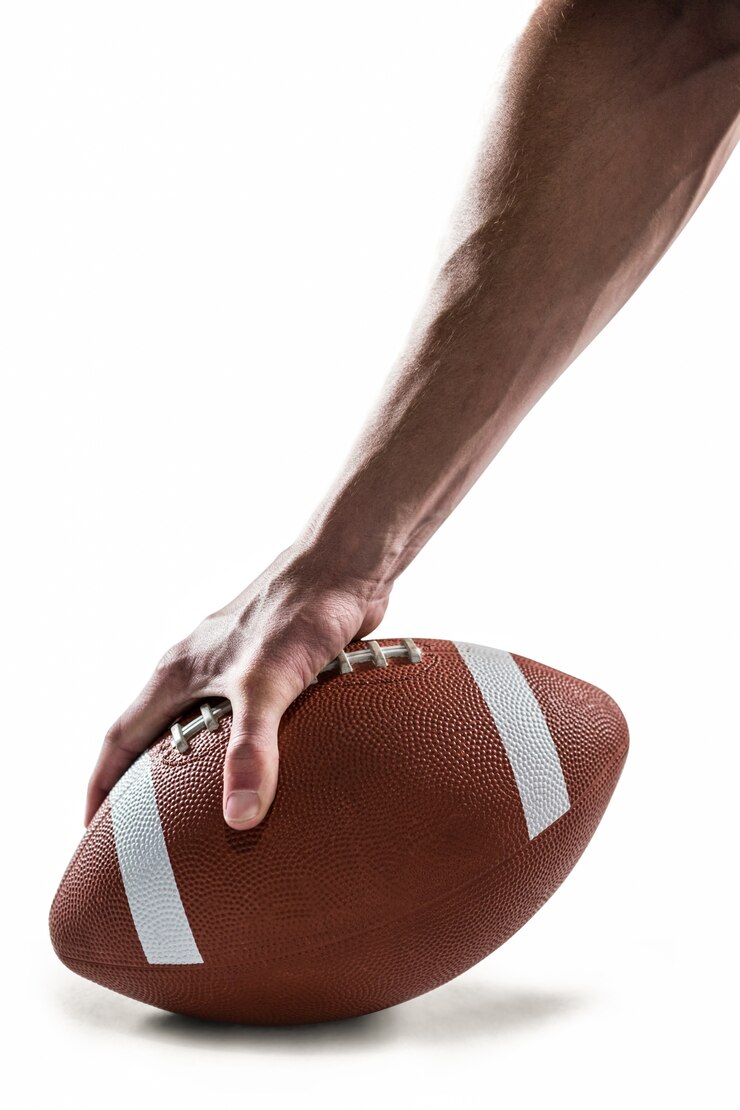 Foto imagem recortada de jogador esportivo segurando bola