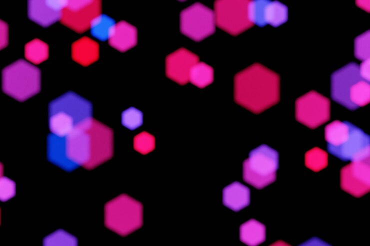 Foto una imagen bokeh borrosa con luces rojas y azules sobre un fondo negro renderización 3d