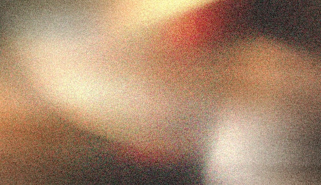 una imagen borrosa de un objeto de color dorado con una franja roja