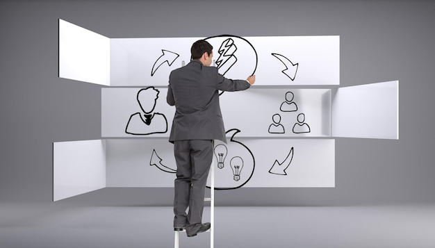 Imagen compuesta del empresario de pie en la escalera escribiendo