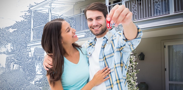 Foto imagen compuesta de la feliz pareja joven mostrando la nueva llave de la casa