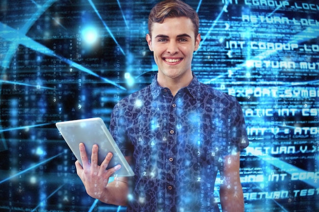 Imagen compuesta de guapo con tablet