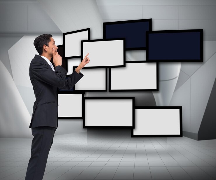 Foto imagen compuesta de pensativo empresario asiático apuntando