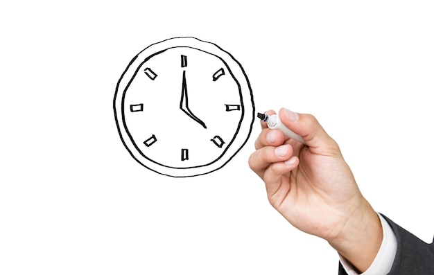 Imagen compuesta de persona de negocios dibujando un reloj sobre fondo blanco.
