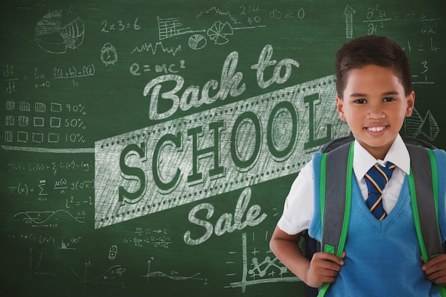 Imagen compuesta de retrato de colegial llevando mochilas contra el fondo blanco.