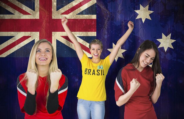 Foto imagen compuesta de varios aficionados al fútbol contra la bandera de australia en efecto grunge