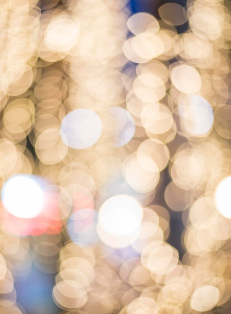 Foto imagen desenfocada de luces navideñas iluminadas