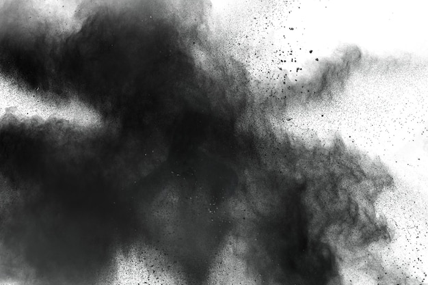 Imagen desenfocada de pinturas de polvo negro contra un fondo blanco