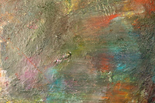 Imagen de fondo del primer plano de la paleta de pintura al óleo brillante
