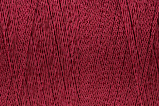 Imagen macro de fondo de color carmesí rojo textura de hilo