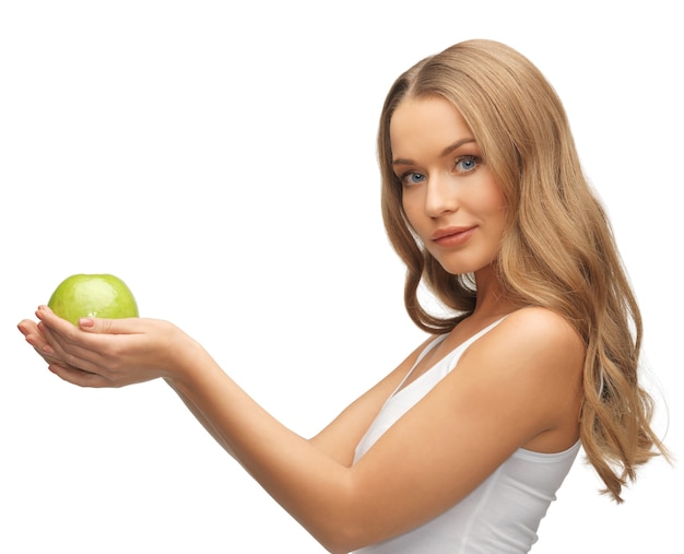 imagen de mujer hermosa con manzana verde.
