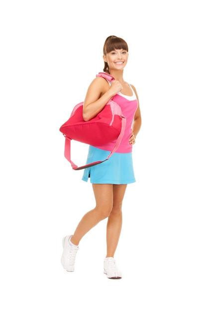 imagen de mujer joven deportiva con bolsa de deporte