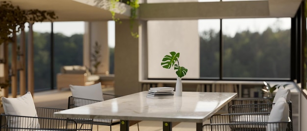 Imagen de primer plano de una mesa de comedor de mármol blanco de lujo en un comedor moderno y hermoso