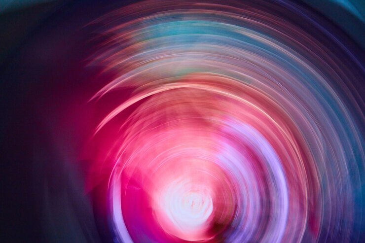 Foto imagen de un remolino brillante surrealista de colores fríos en un desenfoque abstracto de colores