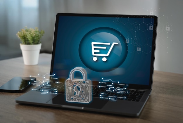 La imagen de seguridad de pago digital muestra una pantalla portátil con icono de carrito de compras rodeada de símbolos de seguridad digital que indican compras en línea