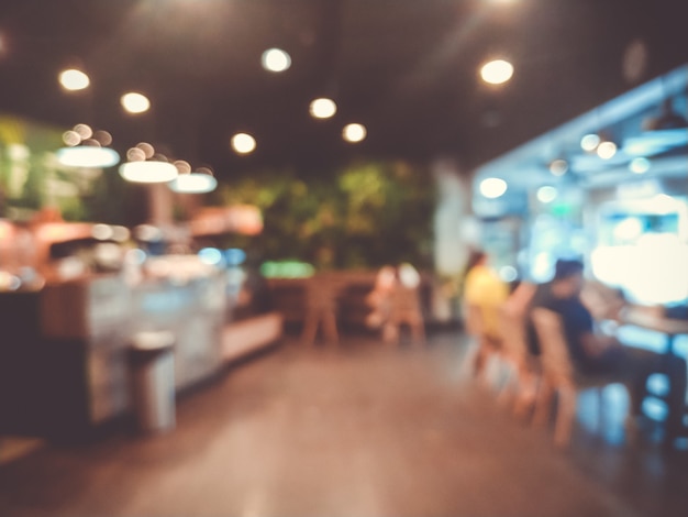 Foto imágenes borrosas del fondo interior del café de la cafetería y la iluminación bokeh