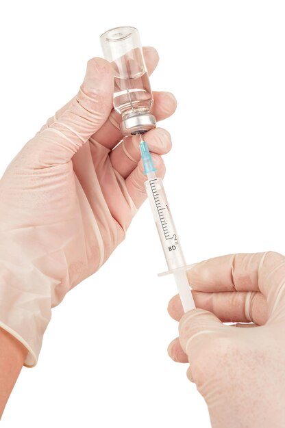 Foto impfstoff in menschlicher hand. gesundheitswesen und medizinisches thema
