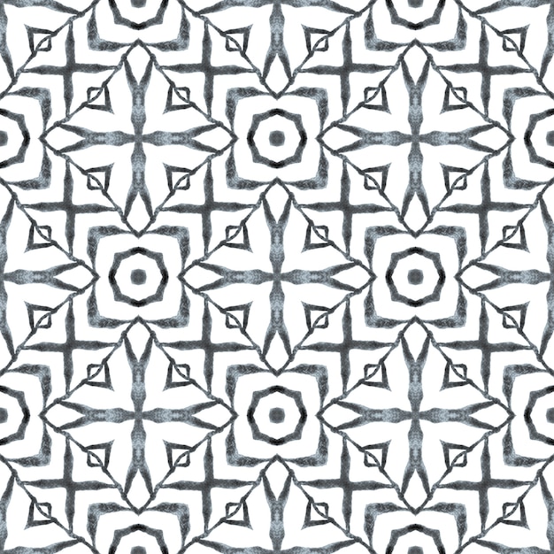 Impresión imaginativa lista para textiles, tela para trajes de baño, papel tapiz, envoltura. Bonito diseño de verano boho chic en blanco y negro. Borde de mosaico repetitivo ikat acuarela. Ikat repite el diseño de trajes de baño.