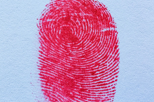 Impressão digital macro vermelhabloody fingerprint como macro de fundo impressão do dedo indicador