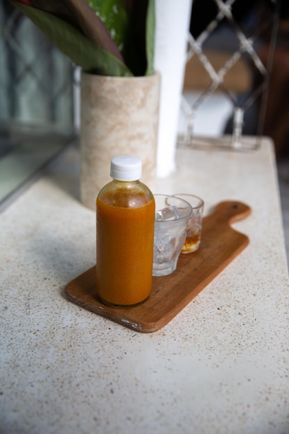 Impulsionador do sistema de imunidade vegano puro Ginger shot com suco de frutas cítricas e açafrão