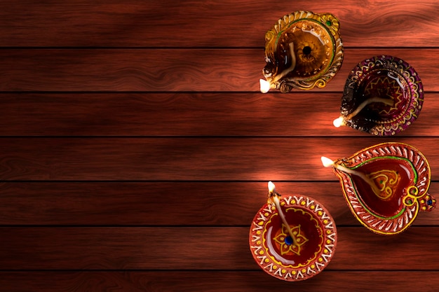 Indische Festival Diwali Diya Öllampen beleuchtet auf farbenfrohen Rangoli hinduistischen traditionellen Kopierraum für Text