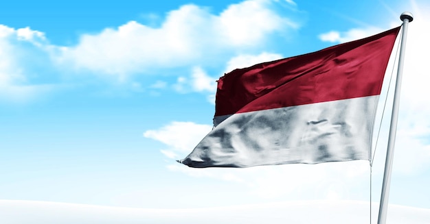 Indonesien schwenkt 3D-Render-Flagge auf blauem Himmelshintergrund. - Bild