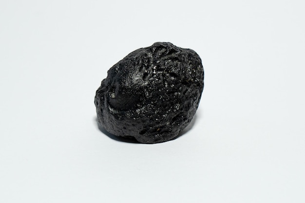 indoquinita meteorito espacio negro roca cosmos tectita