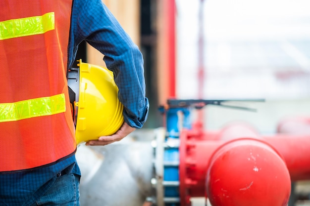 Ingeniero con sombrero duro trabajador de la construcción profesional seguridad trabajo industria edificio persona gerente servicio