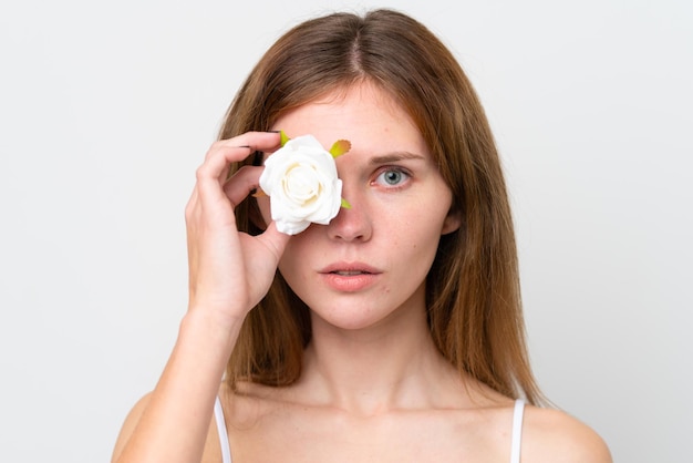 Inglés joven mujer sosteniendo flores Cerrar retrato