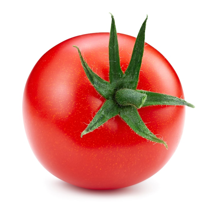 Foto ingrediente alimentario de tomate macro en blanco aislado