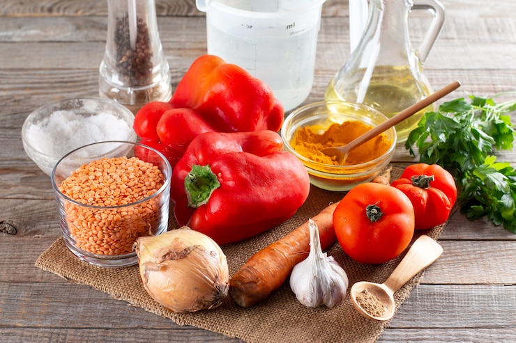 Foto ingredientes para hacer sopa de lentejas. paso a paso. comida sana