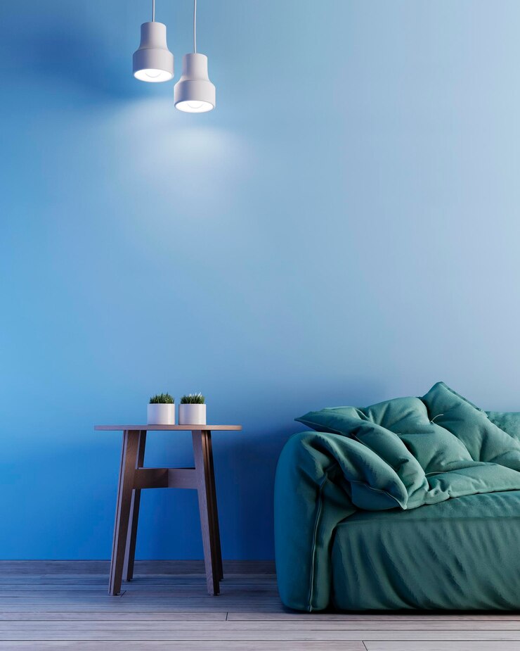 Innenraum mit blauer Wand, grüner Sessel und Beistelltisch aus Holz 3D-Rendering